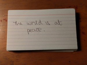 One of my vision cards that says "The world is at peace."